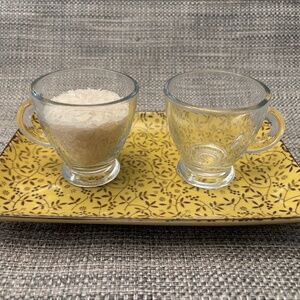 Practical Life Pouring Materials Yellow Tray & Glass Mugs by Idlewild Montessori